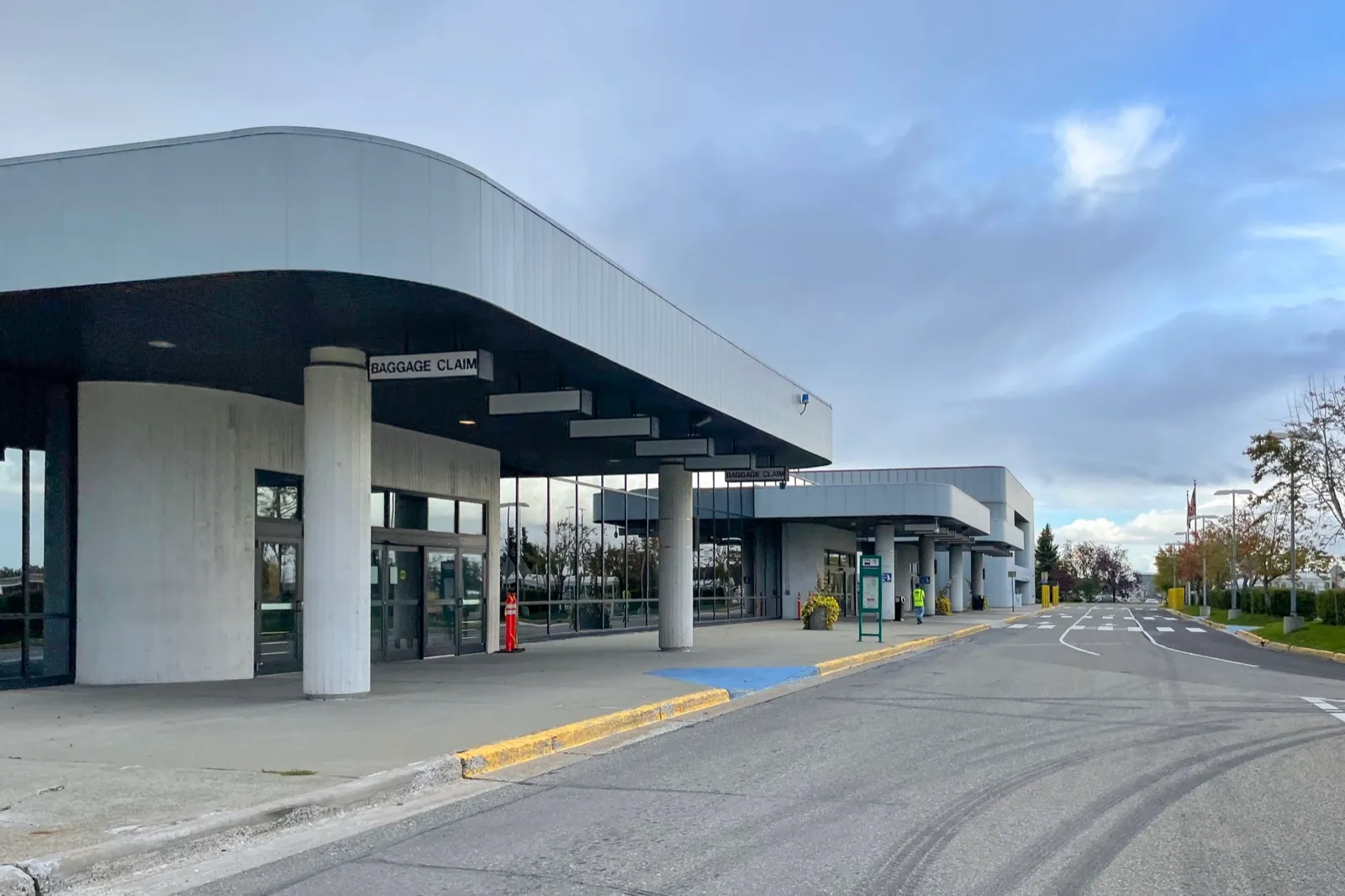 The curb outside baggage claim at the North Terminal of Ted Stevens Anchorage International Airport, where arriving travelers are picked up