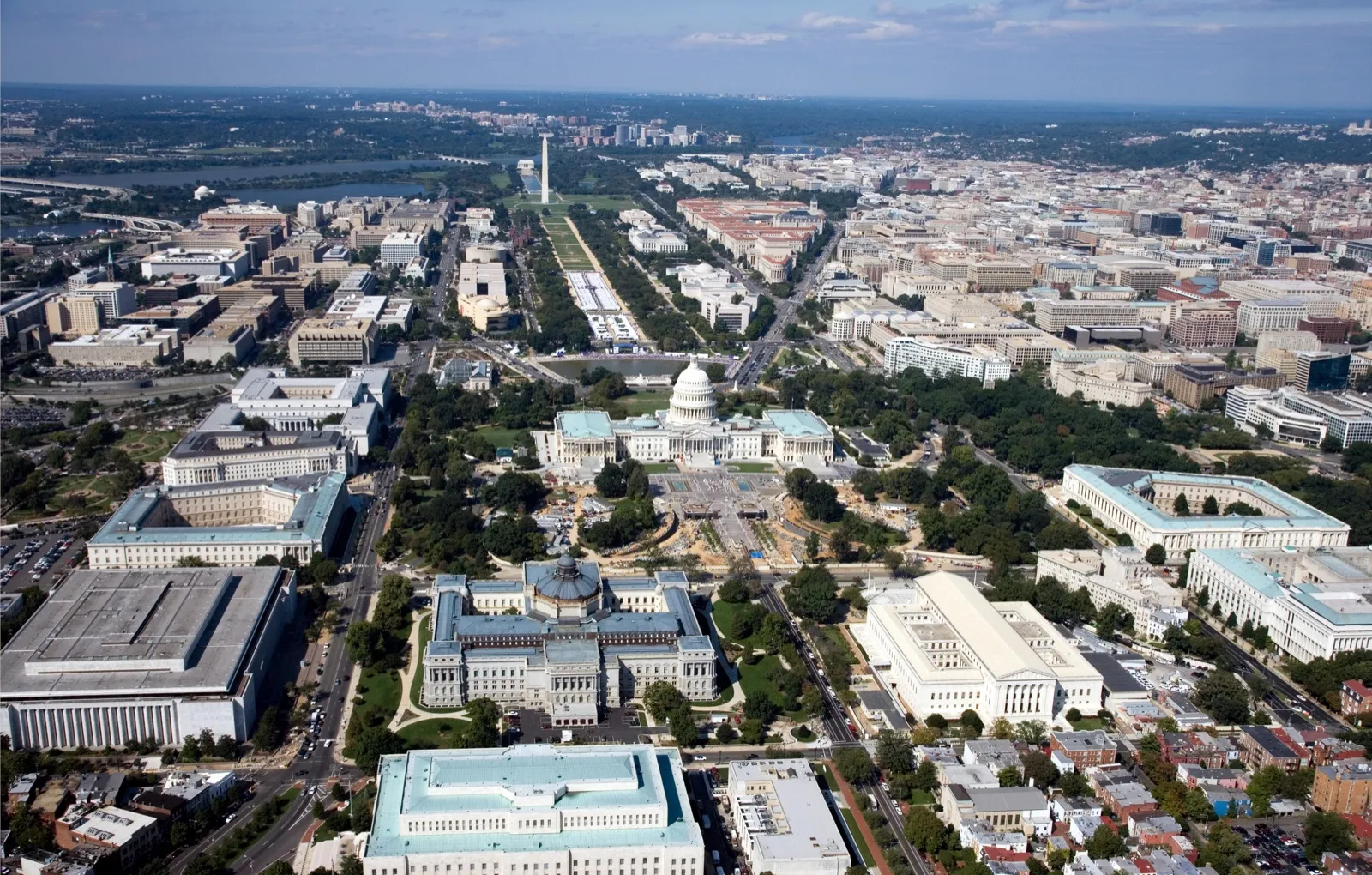 An aerial view of Washington, DC, looking west from Capitol Hill past the Capitol dome and down the National Mall to the Washington Monument