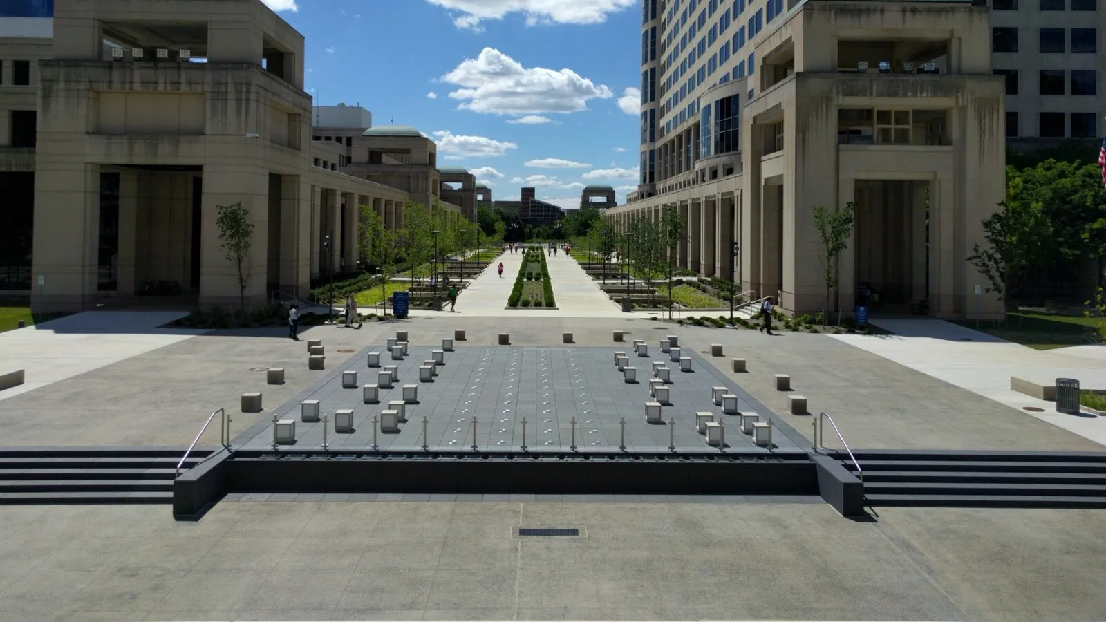 The plaza of the Indiana Government Center in Indianapolis, the state office complex that houses the Family and Social Services Administration, under a blue sky